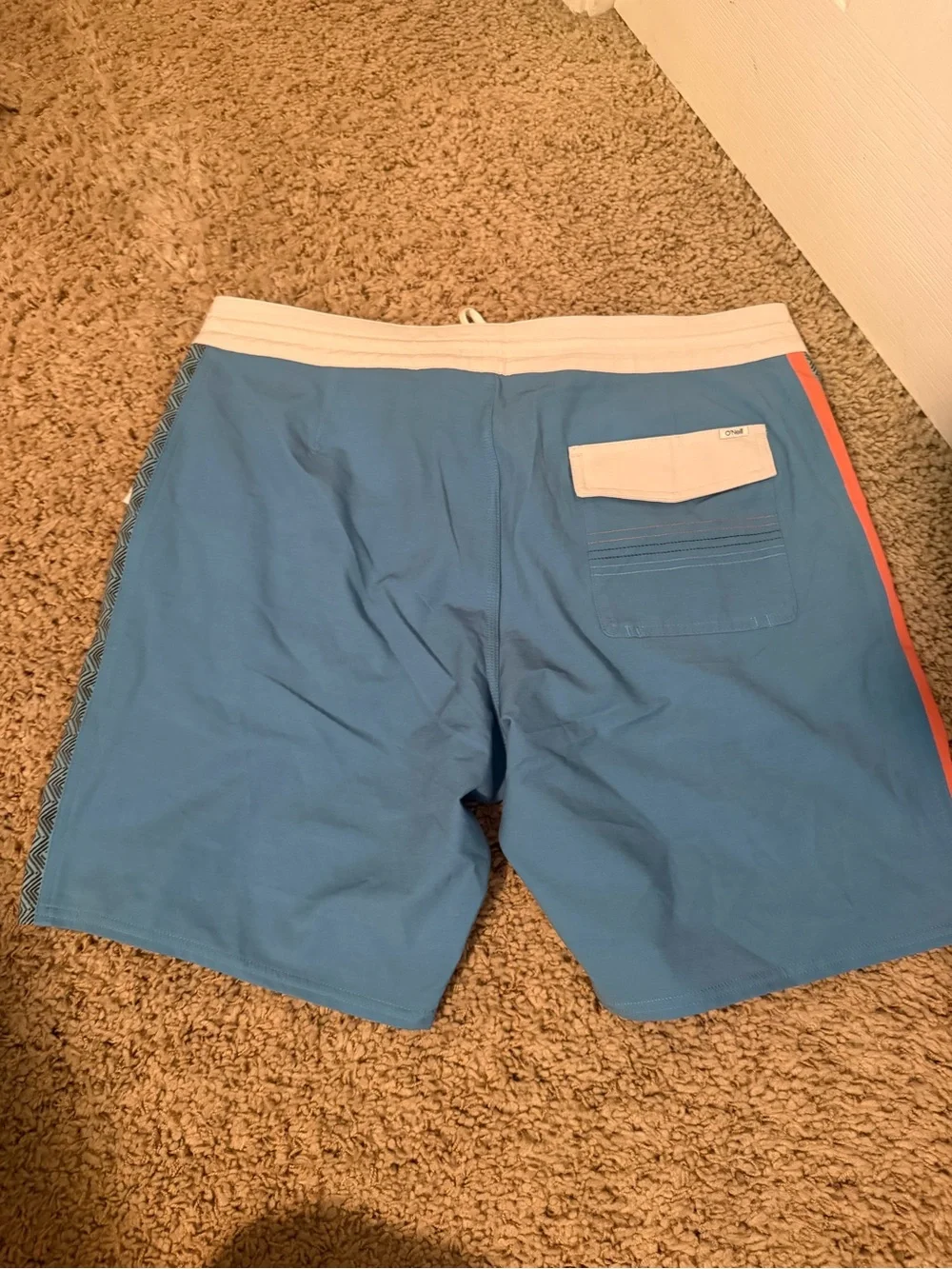 O'Neill Blue Swim Board Shorts with White Waistband and Orange Trim